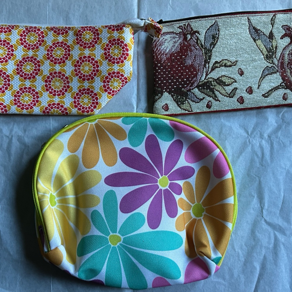 Three makeup travel bags: Clinique, Origins, and Armenian fabric, handmade